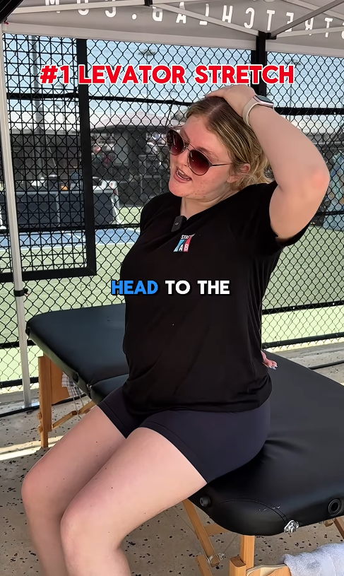 female StretchLab stretch practitioner showing a levator stretch for pickleball players